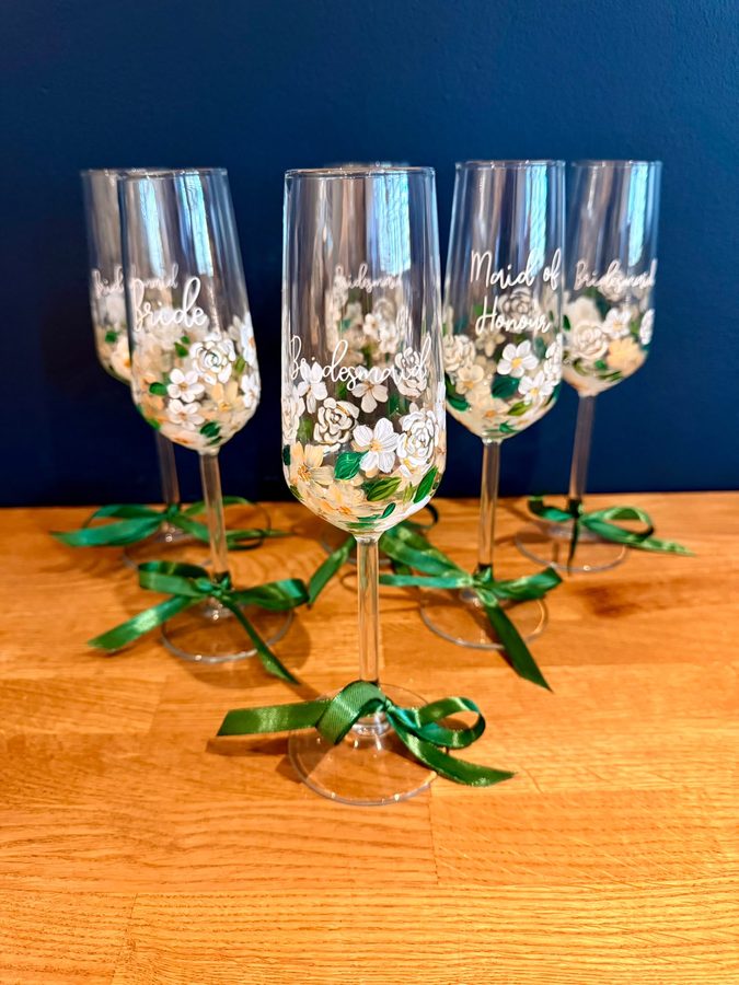 Hand-painted personalised bridal party champagne flutes by The Wright Occasion