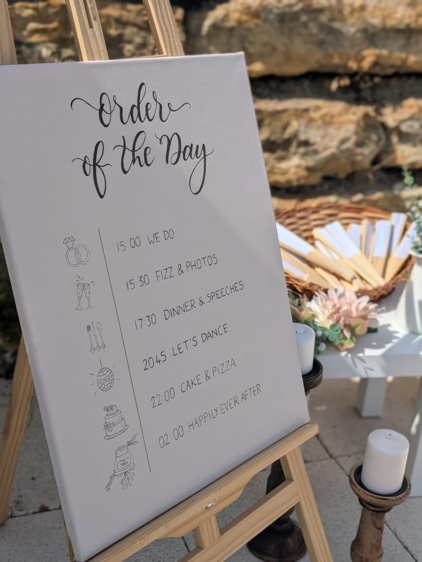 Order of the Day hand-painted canvas on easel outdoors